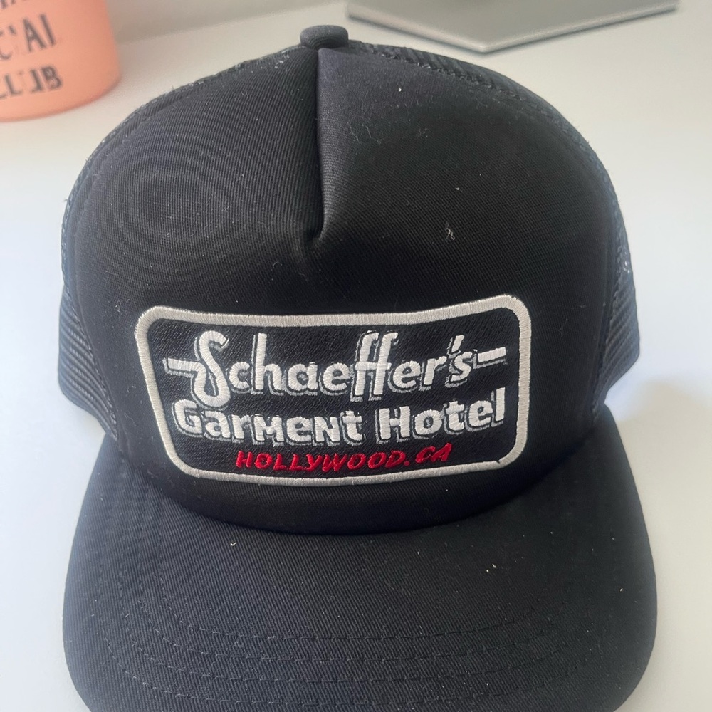 Schaeffer's Garment Hotel Black Trucker Hat
